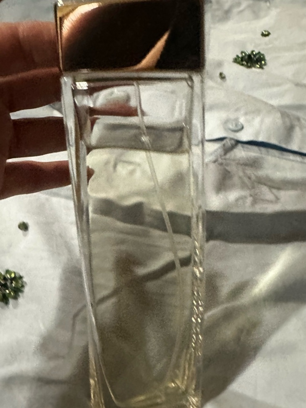 Salvatore Ferragamo Clear Glass Perfume Bottle with Gold-Tinted Liquid